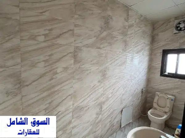 شقة عصرية للإيجار بالرفاع الشرقي 150 د.ب. شامل الكهرباء والماء | موقع حيوي قرب الشارع الرئيسي