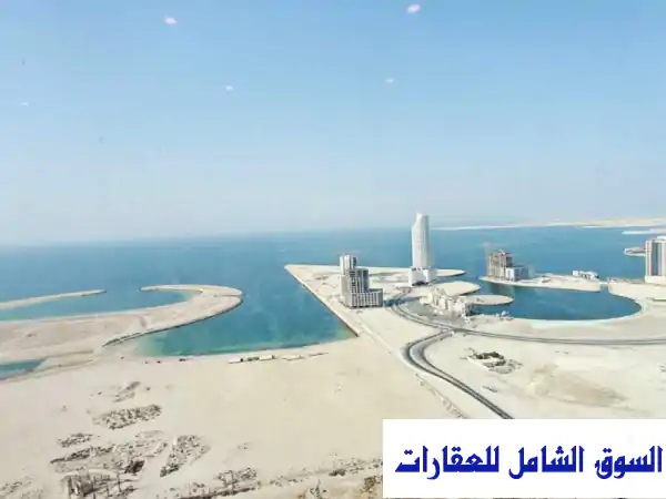 شقة فاخرة مفروشة للإيجار في السيف: إطلالة بحرية خلابة وغرفة نوم واحدة بالمنامة