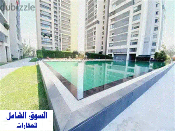 شقة فاخرة للبيع في ووترفرونت سيتي ضبية: استثمارك الأمثل لحياة عصرية وإطلالة بحرية!