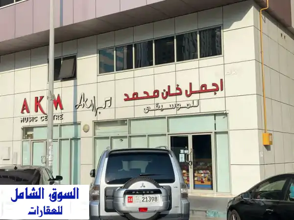 فرصة استثمارية استثنائية في قلب الزاهية بأبوظبي - دكان + ميزان عائد 5 مليون درهم سنوياً!