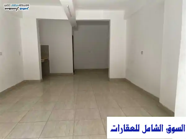 محل تجاري 64 متر² متشطب بالهرم - تمويل عقاري متاح! فرصة ذهبية!