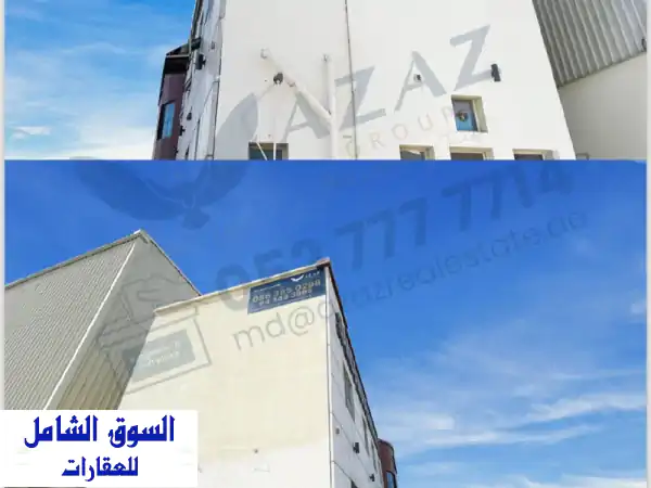 فرصة استثمارية ذهبية! مبنى كامل للإيجار في صناعية أم القيوين
