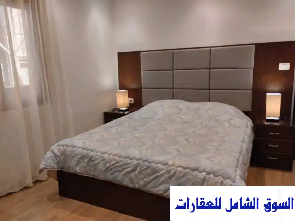 شقة مفروشة فاخرة للإيجار في قلب الدقي - جيزة (200م²) - إطلالة خلابة!