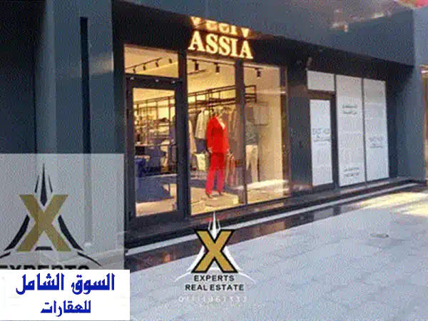 فرصة استثمارية ذهبية! محل تجاري 100 متر² في قلب Open Air Mall - ناصية مميزة بإطلالة خلابة!
