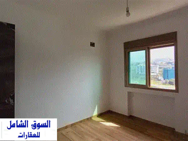 شقة فاخرة للبيع في بلونة - مساحة واسعة وحديقة خاصة!
