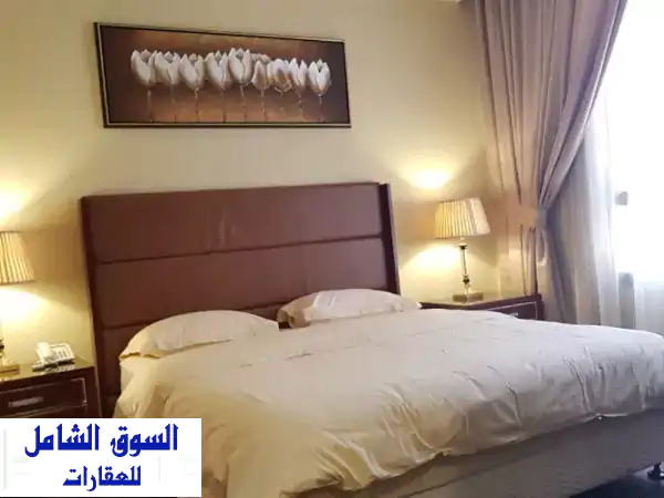 شقة فاخرة بغرفتي نوم في الكويت -  مسبح، صالة...