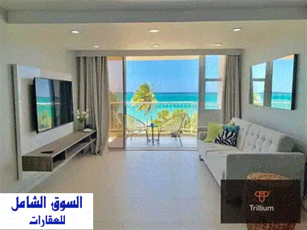 شقة فندقية فاخرة للبيع في زويا الساحل الشمالي -  استثمار ذكي بموقع متميز!