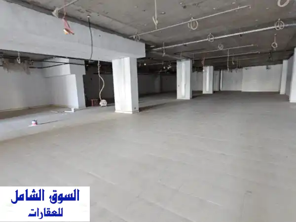 معرض تجاري فاخر للإيجار في الرميلة - عجمان | موقع استراتيجي خلف جينيت ماركت