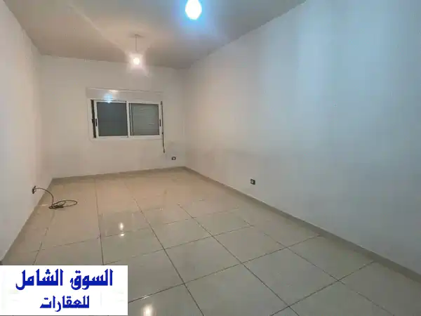 شقة فاخرة للبيع في عين الرمانة - موقع متميز! (AR171)
