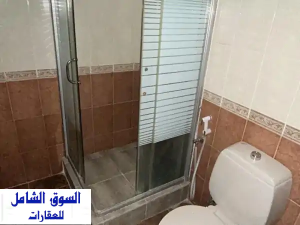 شقة أرضية فسيحة للإيجار في الحد - 3 غرف نوم، حمامين، وموقف سيارات!  (200 دينار)