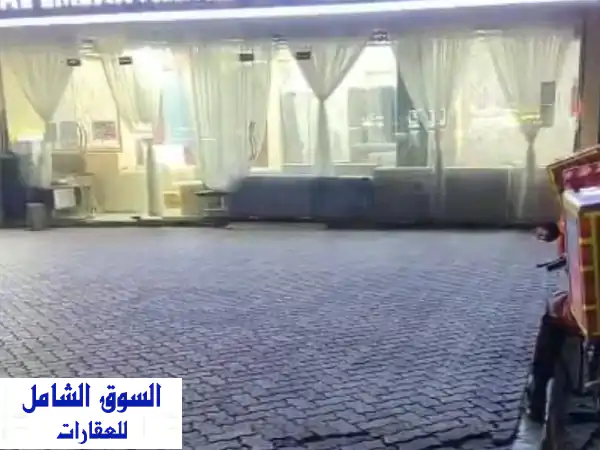 فرصة ذهبية! معرض تجاري مميز في بدع زايد - شارع رئيسي...