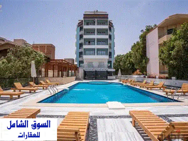 شقة غرفتين نوم 54 متر² على الممشى السياحي بالغردقة - فرصة ذهبية!