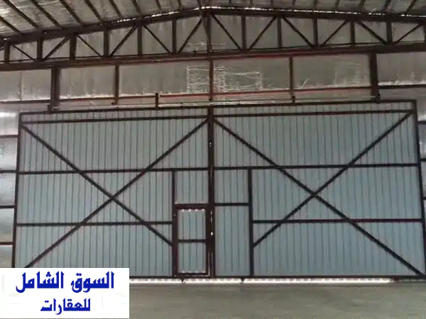 مخزن عملاق للإيجار بأم غرة: 650م² مرخص لمواد البناء | فرصة استثمارية للمقاولين الكبار