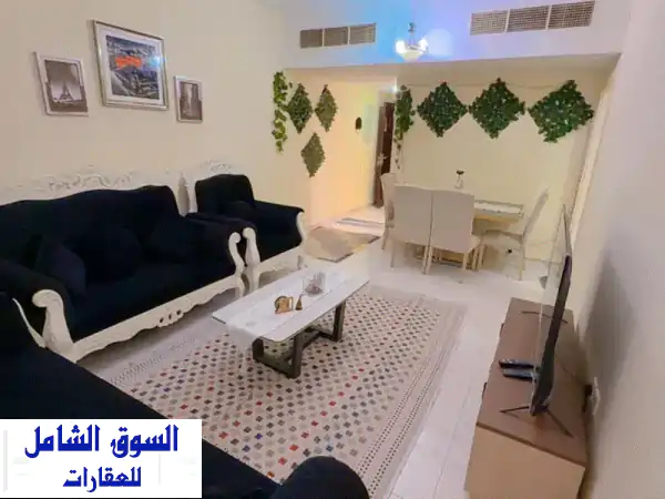 شقة مفروشة 1BHK للإيجار بالخان الشارقة | تشطيب...