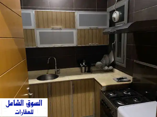 شقة مفروشة للإيجار بالسالمية: غرفتين، مسبح، جيم، مواقف سرداب | سكنك المثالي!