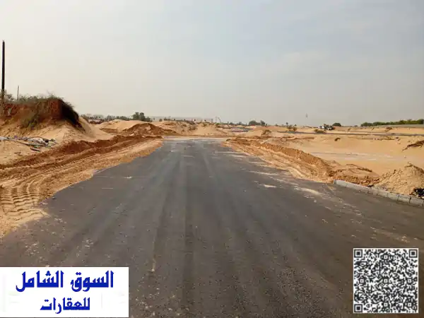فرصة استثمارية لا تعوض! أرض فلل سكنية بالزاهية عجمان - موقع استراتيجي، شامل الرسوم، ومستقبل واعد