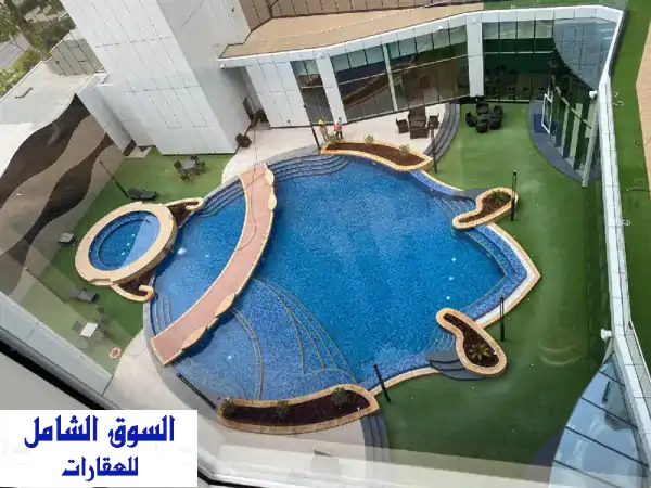 فرصة استثمارية ذهبية: استوديو فاخر ومفروش بالكامل للبيع في قلب خليج البحرين | عائد شهري فوري!