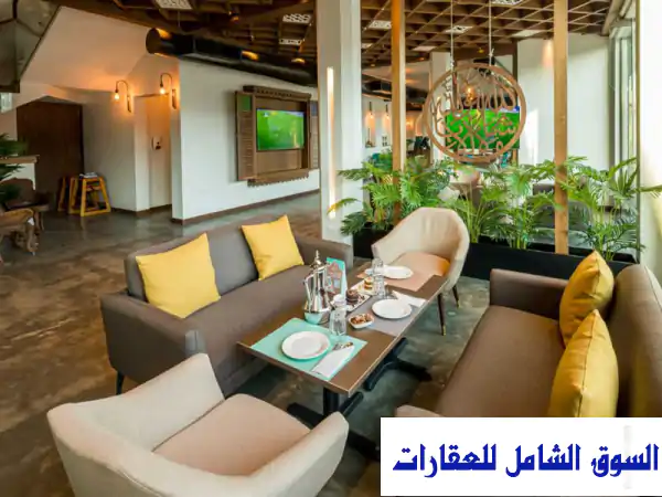 كوفي شوب ومطعم راقي في دستركت ون للبيع...