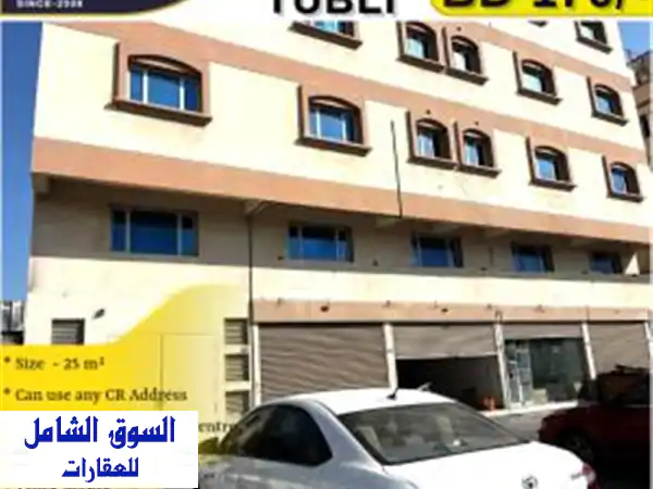 محل تجاري مع طابق نصفي للإيجار في توبلي