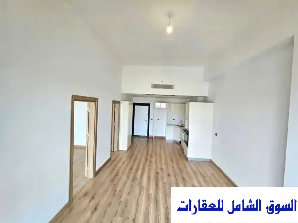 للبيع شقة فارغة 1+1 شبة جديدة ومميزة ضمن المجمع الجديد غوموش بانوراما اسطنبول في Zafer أسنيورت إسطنبول