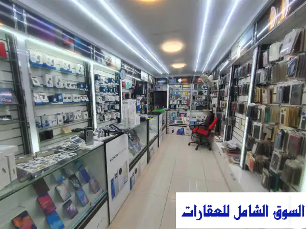 محل هواتف متحركة للبيع بالكامل في وسط المدينة...