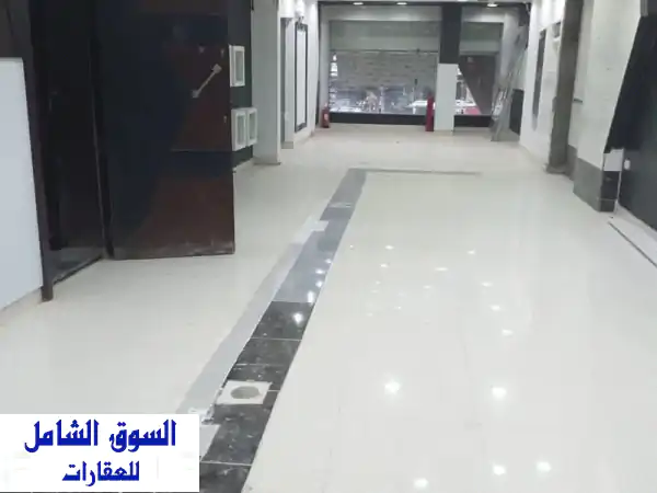 فرصة استثمارية ذهبية: محل بميزان 220م للبراندات والتوكيلات الكبرى بشارع 45 بحري الرئيسي - تشطيب سوبر لوكس