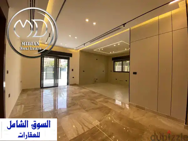 شقة أرضية جديدة وفاخرة للبيع في دير غبار | 250م بحديقة وترس خاص 150م | تشطيبات عصرية