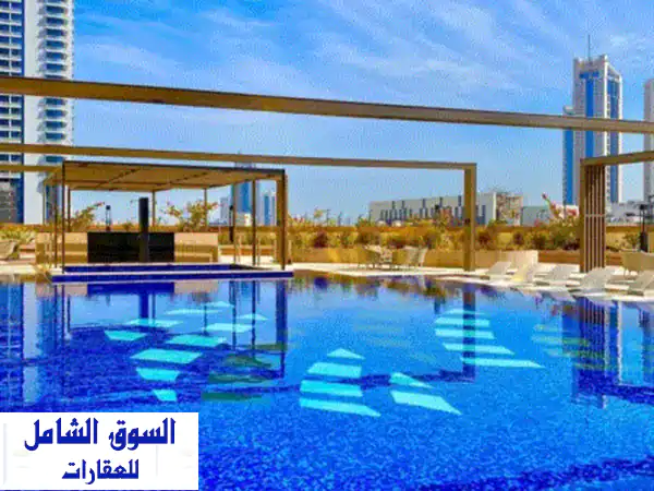 للإيجار بضاحية السيف: شقة فاخرة غرفتين ماستر، مسبح، جيم، شامل الكهرباء - قرب سيتي سنتر!