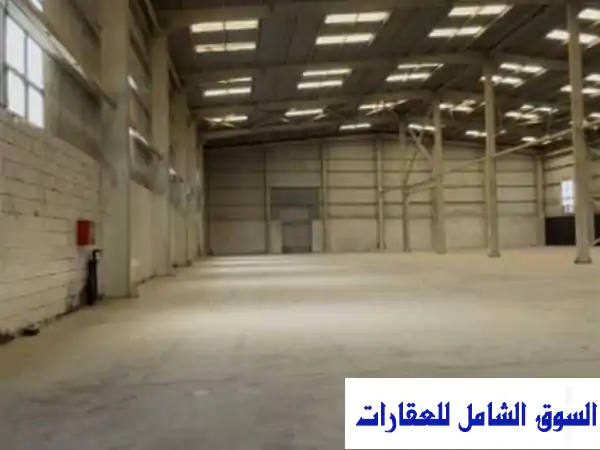 فرصة ذهبية! مخزن جمالون مرخص 6000م للإيجار بأبو رواش الصناعية، الجيزة (مساحات مرنة)