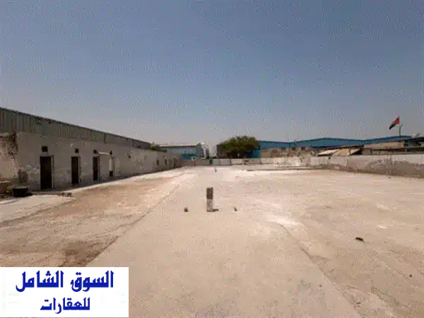 حوش للإيجار في الصناعية 11 على شارع رئيسي، مساحة 20000...