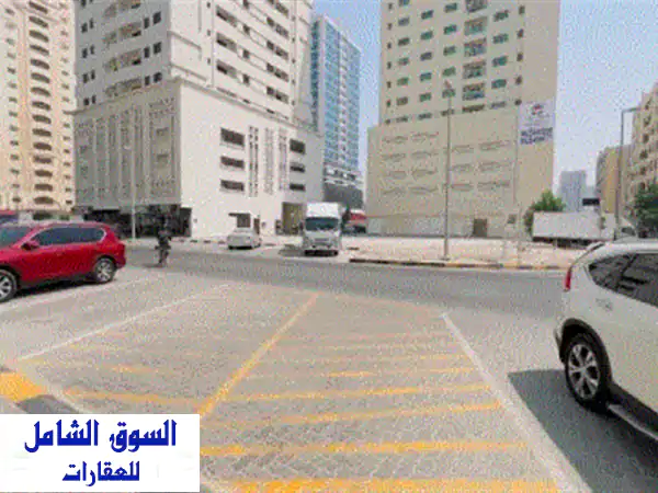 للبيع أرض في الشارقة بمنطقة بوشغارة حي القاسمية تصريح (أرضي + 3 طابق مواقف + 15 طابق متكرر مساحة ...