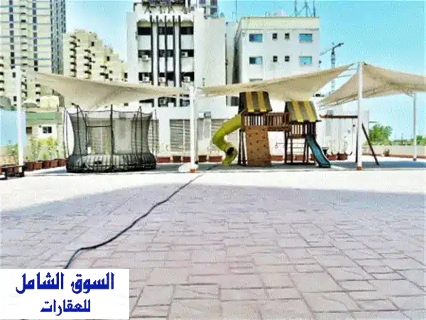 منزلك المثالي! شقق فاخرة 3 غرف نوم للإيجار - برج عصري شبه مفروش بالقرب من مدينة الكويت | للمغتربين