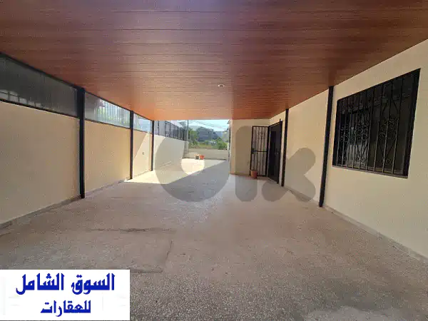 شقة أرضية فخمة للبيع في الضبية | تراس خاص 150م² وبيرجولا | 145م² مع حديقة هادئة