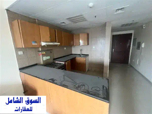 اعادة بيع استوديو واسع  النعيمية تاور c مطبخ أمريكي  حمام  بلكونه  المساحة 554 قدم  جاهز للسكن ...