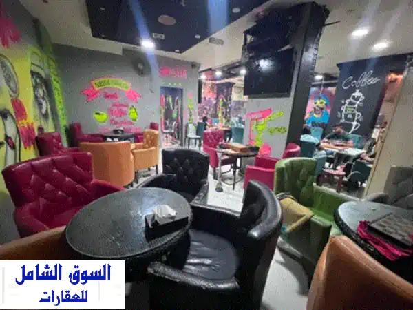 فرصة ذهبية: كافية جاهز للبيع أو الإيجار بموقع استراتيجي على شارع الشيخ خليفة، النعيمية عجمان | دخل مضمون