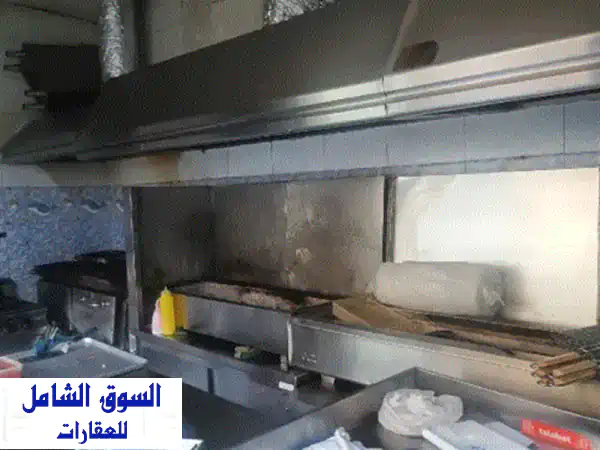 فرصة استثمارية ذهبية: مطعم مجهز بالكامل للبيع في الشارقة بموقع حيوي وموقف خاص!