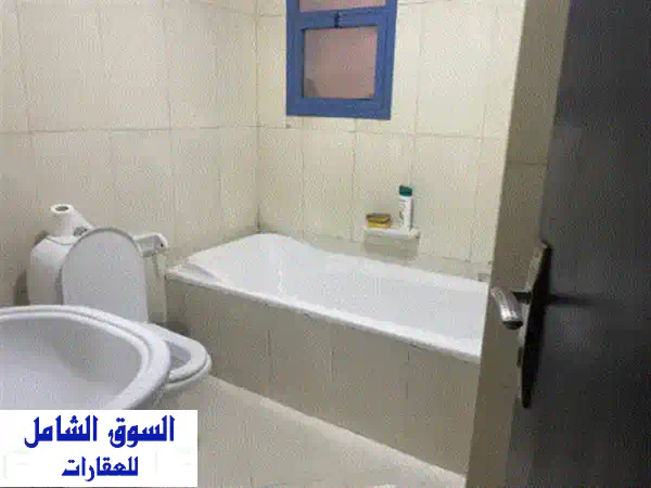 امتلك الآن: شقة مفروشة أنيقة (غرفة وصالة) للبيع في أبراج النعيمية عجمان | موقع حيوي وجاهزة للسكن الفوري!