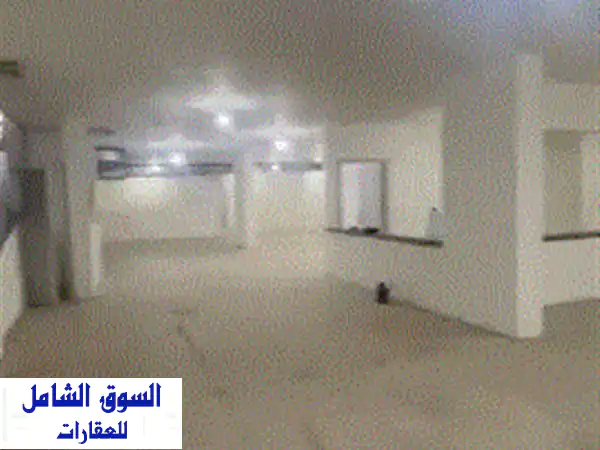 فرصة ذهبية: مستودع للإيجار طريق المطار 1400م | ارتفاع 6م | بـ 2500$ فقط!