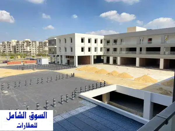 مكتب 52 متر للبيع في مول بيازا الشيخ زايد  بمقدم 585...
