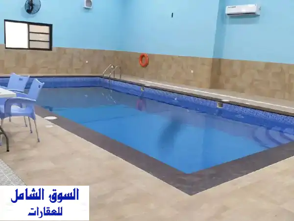 استراحة للبيع في عراد فيها 2 حمام سباحة مع كل...