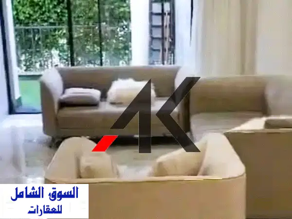 شقة أحلامك بحديقة خاصة: مفروشة بالكامل للإيجار في...