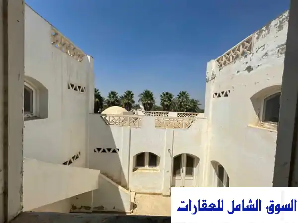 فيلا للبيع بقرية الكتاب، سفنكس الجديدة 6 أكتوبر | فدان مانجو مُثمر + 9 فدادين استثمارية