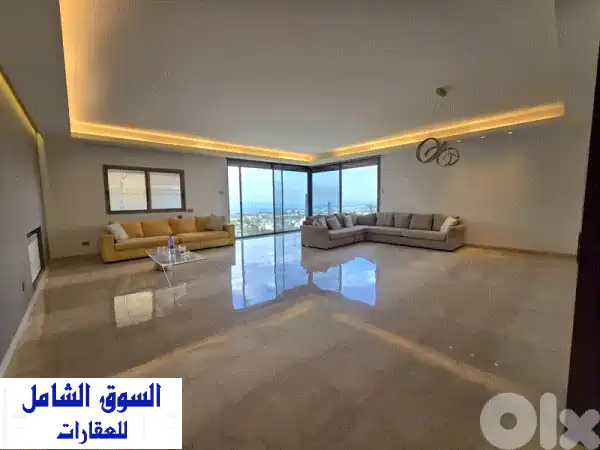 ملاذك الفاخر: شقة واسعة بتراس بإطلالة ساحرة للإيجار...