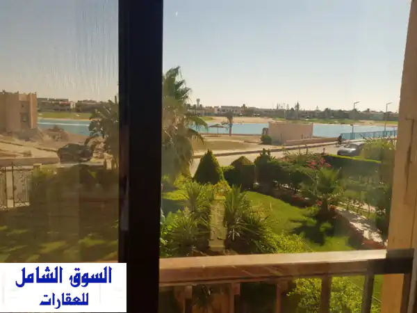 فيلا الأحلام تنتظرك بمارينا 5 (E7322): 4 غرف ماستر، حدائق خضراء، ورفاهية الساحل الشمالي!