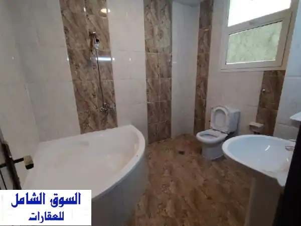 فرصة ذهبية: استوديو سوبر لوكس للإيجار بمدينة شخبوط - شامل الفواتير وقرب المطار!