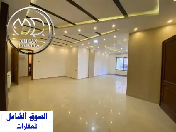 شقة أرضية فاخرة للبيع بتلاع العلي | 175م + تراس 80م | تشطيبات سوبر ديلوكس بسعر مميز