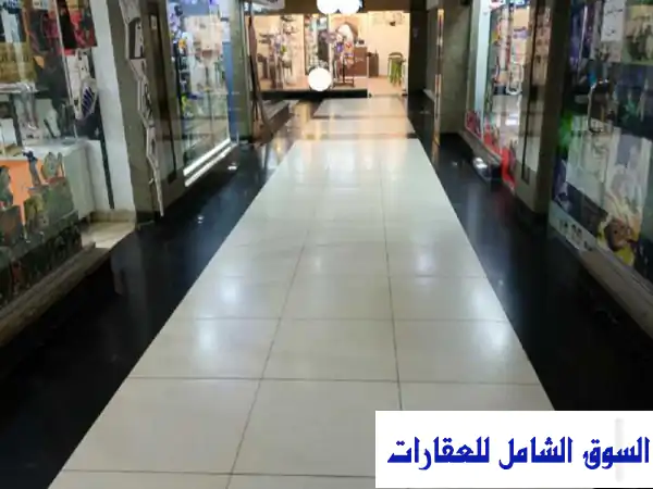 فرصة ذهبية: محل/مكتب 32م2 مفروش سوبر لوكس للإيجار بمزار مول الهرم | موقع استراتيجي بجوار كايرومول