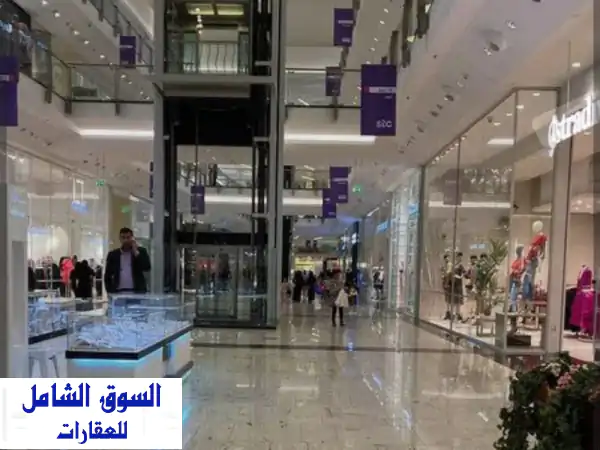 فرصة استثمارية ذهبية: مول تجاري عملاق للبيع أو الإيجار في عجمان - عائد 15 مليون درهم سنوياً!