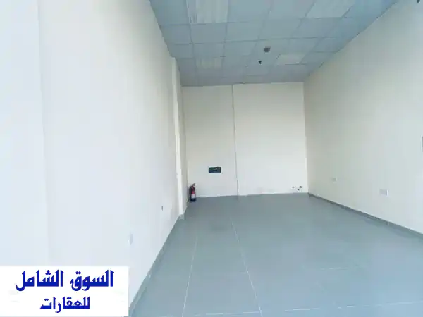 فرصة ذهبية! محل تجاري مميز للإيجار السنوي بالروضة 2 عجمان - 25م² بميزانين بسعر لا يصدق