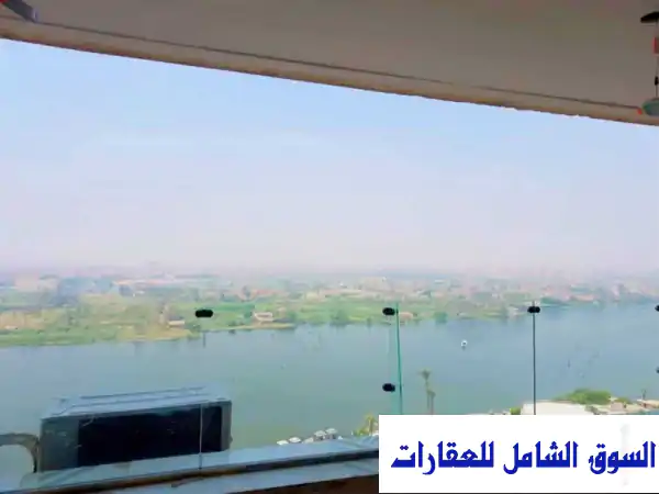 شقة فندقية VIP فاخرة للإيجار اليومي/الشهري على النيل مباشرة | كورنيش المعادي، القاهرة | إطلالة ساحرة للأهرامات والعائلات